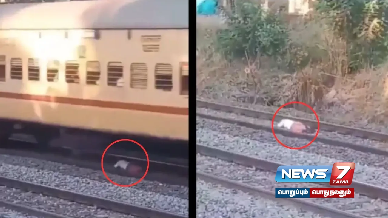 Train passes drunk man studying on railway tracks... Video goes viral!